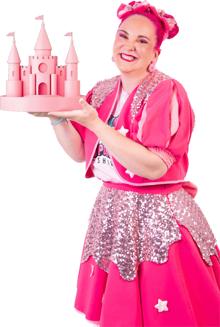 Cuca holding a pink castle in the palm of her hand